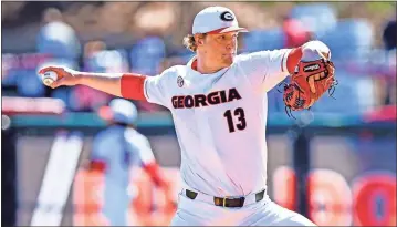  ?? Anthony Walsh ?? Georgia pitcher Cole Wilcox winds up during a game against Massachuse­tts at Foley Field in Athens on March 7. The Heritage High alum recently signed on to begin his career with the San Diego Padres, who drafted him on June 11.