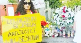  ??  ?? Rose Marie Drummond, left, attends a vigil in Barrie, Ont., for Olando Brown, seen at right. Video taken by a bystander on June 22 appears to show police using a stun gun on 32-year-old Brown more than once. He went into “medical distress” and died...