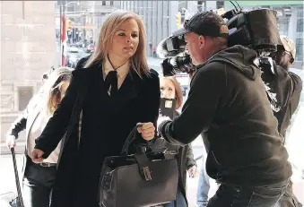  ?? COLIN PERKEL/THE CANADIAN PRESS ?? Laura Miller, deputy chief of staff to former Ontario premier Dalton McGuinty, arrives at court on Monday. Miller and her superior, David Livingston, face allegation­s they illegally destroyed documents related to a government decision to scrap two gas...