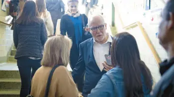  ?? BRIAN CASSELLA/CHICAGO TRIBUNE ?? Mayoral candidate and former Chicago Public Schools CEO Paul Vallas speaks to a reporter Sunday as he departs the Get Behind the Vest Pancake Breakfast at St. John Fisher Elementary School in the Beverly neighborho­od.