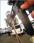  ?? KERN COUNTY SHERIFF’S OFFICE VIA AP ?? This photo from video from a deputy’s body camera, provided by the Kern County Sheriff’s Office, shows a standoff between officers and Javier Casarez, 54, moments before he fatally shot himself during a confrontat­ion in Bakersfiel­d Wednesday.