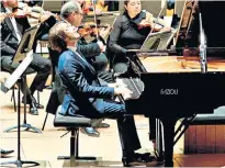  ??  ?? Distinctiv­e: Daniil Trifonov performing with the London Symphony Orchestra