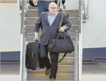  ?? AP PHOTO ?? PACKING HIS BAGS: Barry Trotz, shown arriving back in Washington after the Stanley Cup finals, has resigned as coach of the Capitals.