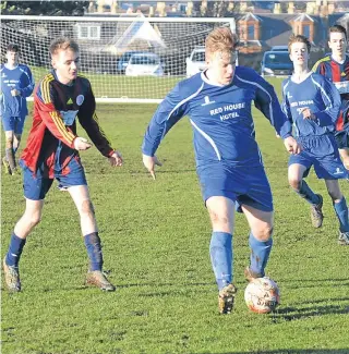  ??  ?? Coupar Angus U/19s (blue) edged a close contest between themselves and Monifieth at Riverview with the visitors winning 1-0.