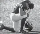  ??  ?? Michigan’s Adam Shibley takes a knee after theWolveri­nes lost to the Spartans on Saturday at Michigan Stadium.