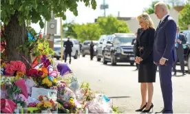  ?? Photograph: White House/Rex/Shuttersto­ck ?? ‘In America, evil will not win, I promise you.’ Joe and Jill Biden pay their respects at a memorial near the store in Buffalo where a gunman killed 10 people and wounded three others last weekend.