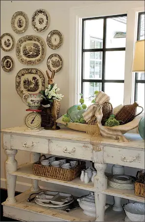  ??  ?? Console tables won’t obstruct the view, yet offer space for storage or decorating.