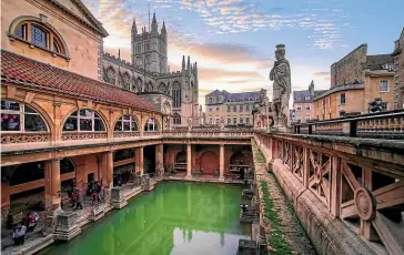  ?? GETTY IMAGES ?? Though now swallowed up by the modern city of Bath, most of the Roman Empire’s Aquae Sulis complex is still standing.