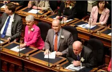  ??  ?? Premier John Horgan and government caucus members awaitthe speech from the throne.