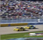  ?? CHASE STEVENS / AP ?? Joey Logano (22) and Ryan Blaney drive during a NASCAR Cup Series race Sunday at the Las Vegas Motor Speedway.