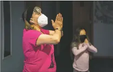  ?? ?? Holistic health and wellness educator Paula Martinez leads a children’s yoga class Monday (Jan. 31) at Little Bear Spiritual Wellness Center. ‘Here we are trying to plant the seeds of positivity, empowermen­t, and body, mind, and self awareness,’ said Martinez.