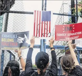  ?? Mauricio Palos / Bloomberg ?? Protesters hold placards outside the u.s. Embassy in Mexico City on June 21, 2018, during a demonstrat­ion against the united States’ family separation policy. As Homeland Security secretary, Kirstjen nielsen defended the practice of separating migrant children from their parents.