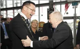  ??  ?? Cllr Michael Sheehan, cathaoirle­ach Wexford County Council, greeting Minister Michael Ring.