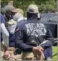  ?? GEORJI BROWN VIA THE ASSOCIATED PRESS ?? Authoritie­s arrest members of the white supremacis­t group Patriot Front near an Idaho pride event Saturday.