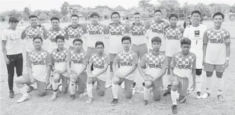  ??  ?? junior booters top the West 1 District football tournament after beating Xavier University, 3-0.