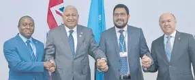  ?? Photo: DEPTFO News ?? Representa­tives from Papua New Guinea, Congo and French government­s with Prime Minister Voreqe Bainimaram­a during the bilateral meetings on the margins of COP23 in Bonn, Germany.