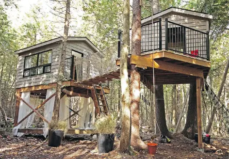  ?? PHOTOS: ?? This tree house village was designed and built by interior designer Sarah Keenleysid­e and contractor Brian McCourt on HGTV’s Backyard Builds.