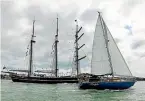  ?? NATHAN THOMAS ?? Connor sails past the Spirit of Adventure in Auckland’s Waitemata¯ Harbour.