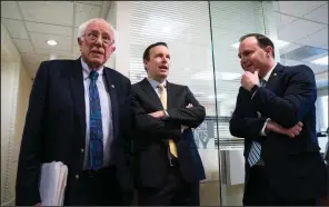  ?? AP/J. SCOTT APPLEWHITE ?? Sens. Bernie Sanders of Vermont (from left), Chris Murphy of Connecticu­t and Mike Lee of Utah meet Wednesday in Washington before a news conference on the Senate vote on ending U.S. support for the Saudi Arabian-led coalition fighting in Yemen.