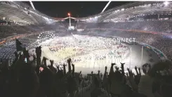  ??  ?? Athletes enter the Olympic Stadium during the closing ceremony of the Athens 2004 Olympic Games August 29, 2004. Greece staged a giant party to celebrate having brought the Games back to their spiritual home in triumphant style.