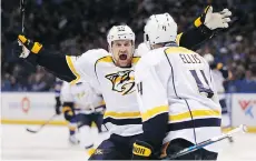  ?? JEFF ROBERSON/THE ASSOCIATED PRESS ?? Nashville Predators left wing Cody McLeod, left, seen celebratin­g a goal with defenceman Ryan Ellis on Friday in St. Louis, says Nashville “has been a great place to play.”