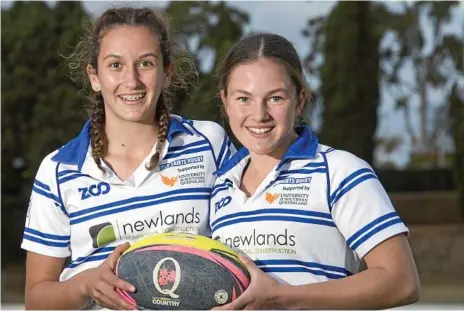  ?? Photo: Nev Madsen ?? VIVA LA FRANCE: Chloe Cocks (left) and Holly Anlezark will head to France next month for the Paris World Games. The Toowoomba pair who plays rugby sevens for University Saints and West Bulldogs will be part of a Tribe representa­tive team competing at...
