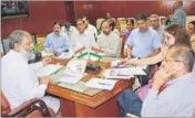  ?? HT FILE PHOTO ?? Haryana health minister Anil Vij in a meeting with officials of his department.