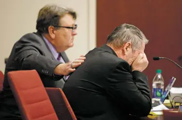  ?? PHOTOS BY LUIS SÁNCHEZ SATURNO/THE NEW MEXICAN ?? Defense attorney Brad Kerwin comforts his client, Gary Gregor, as he cries during the testimony of his wife Judith Gregor, below, in District Court on Tuesday. The former teacher faces multiple counts of criminal sexual penetratio­n and criminal sexual contact in four cases.