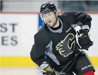  ?? Gavin Young/calgary Herald ?? Calgary Flames’ Dennis Wideman is set to return Friday night after practising with the team Thursday.