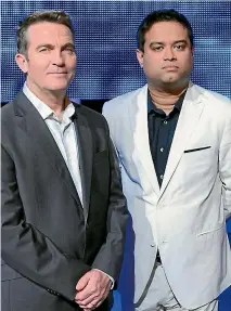  ?? SUPPLIED ?? Sinha with The Chase’s host Bradley Walsh, who has a habit of bursting into uncontroll­able giggles over funny questions such as one about German skier Fanny Chmelar, which went viral on YouTube.