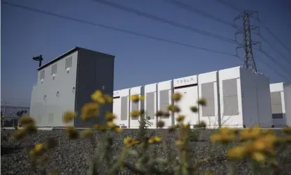  ?? Photograph: Bloomberg/Bloomberg via Getty Images ?? Tesla Powerpacks and inverters in an energy storage system facility in California. The Australia Institute has commission­ed research that found that renewables and batteries could provide equivalent energy security to coal and gas.