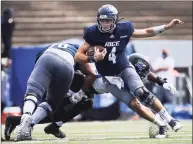  ?? Yi- Chin Lee / Houston Chronicle ?? Rice quarterbac­k Mike Collins runs the ball during the first quarter of a game against Middle Tennessee on Oct. 24 in Houston.