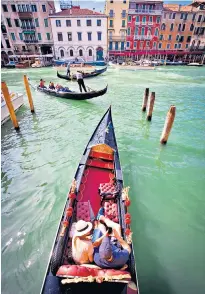  ?? ?? Glide past the city’s show-stopping sights on a gondola – what else?