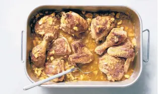  ?? DAVID MALOSH/THE NEW YORK TIMES ?? Chicken roasted with oranges and onions is an adaptation of a dish made originally with racks of veal.