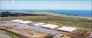  ?? The Maui News / MELISSA TANJI photo ?? This is an aerial view the hydroponic farm on Lanai, which is producing vegetables currently sold on the island. This is a screenshot of a slide in a presentati­on by Kurt Matsumoto of Pulama Lana‘i on Thursday.