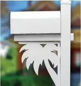  ??  ?? Cartoonist Dave Horton designed these mailbox brackets, made from weather-resistant PVC, that range from fish and wildlife to palm trees and holiday snowflakes. Some homeowners buy several, changing them to match the season.