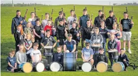  ??  ?? Good luck The Renfrewshi­re Schools Pipe Band