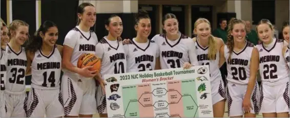  ?? OTSPORTSCH­EK — COURTESY PHOTO ?? The Merino Lady Rams pose for a photo after winning the 2023 NJC Holiday Basketball Tournament championsh­ip.