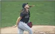  ?? JIM MONE — THE ASSOCIATED PRESS ?? Mike Clevinger watches the flight of a home run off the bat of the Twins’ Eddie Rosario during the first inning July 31 in Minneapoli­s.