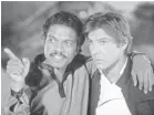  ?? LUCASFILM ?? Lando Calrissian (Billy Dee Williams) and Han Solo (Harrison Ford) came together as partners in crime in 1980’s “The Empire Strikes Back.”