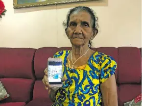  ?? Photo: Inoke Rabonu. ?? 75 year-old Guddi Suruj holds a picture of her late sister Indira Kumari at her Muanikoso home on August 8, 2020.