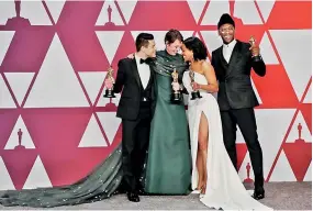  ??  ?? Best Actor Rami Malek, Best Actress Olivia Colman, Best Supporting Actress Regina King and Best Supporting Actor Mahershala Ali pose with their Oscars backstage at thew Academy Awards. REUTER