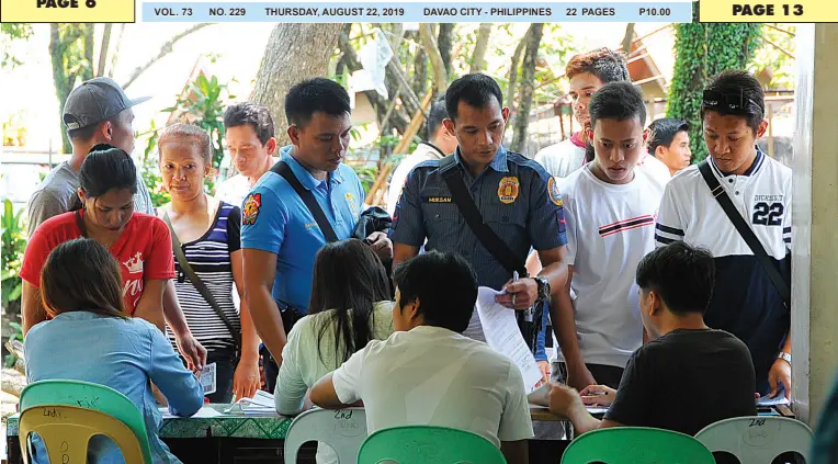  ??  ?? POLICE officers work for their transfer of registrati­on after receiving their reassignme­nt from the PNP. They join the other residents who are also moving to other polling precincts. The Commission on Elections will process the applicatio­n for transfers until Sept. 30. BING GONZALES