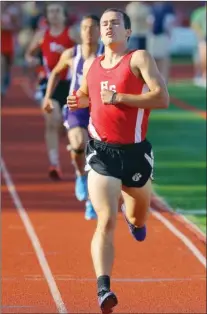  ?? FILE PHOTO ?? Malachi Cannon of Heber Springs crosses the finish line to win the boys 1,600-meter run during the Class 4A State Track Meet at Heber Springs High School last month.