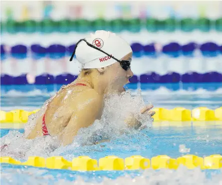  ?? SCOTT GRANT/SWIMMING CANADA/FILES ?? Rachel Nicol, shown swimming in the heats of the Pan Am Games last year in Toronto, was comforted to qualify for the 2016 Rio Olympics in the same pool where she had won Pan Am silver and bronze the year before.