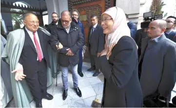  ??  ?? Dr Wan Azizah arrives for a visit to Paris Grand Mosque and greeted by Dr Dalil Boubakeur (left). — Bernama photo