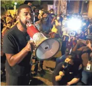  ?? JOE RONDONE/THE COMMERCIAL APPEAL ?? Darin Abston Jr. speaks to protesters at a rally at the National Civil Rights Museum on May 31.