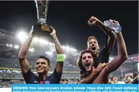  ??  ?? SHENZHEN: Paris Saint-Germain’s Brazilian defender Thiago Silva (left), French midfielder Adrien Rabiot (center) and Brazilian forward Neymar Jr celebrate with the trophy after winning the French Trophy of Champions (Trophee des Champions) football match between Monaco (ASM) and Paris Saint-Germain (PSG) in Shenzhen. —AFP