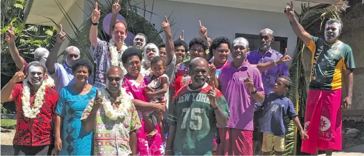  ?? Photo: Jacod Pauu ?? InterConti­nental Fiji Golf Resort and Spa area general manager Andrew Davidson (back left) with villagers at the new ablution block at Sanasana Village, Nadroga, on January 5, 2018.