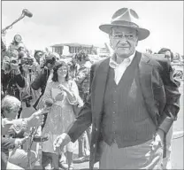  ?? Los Angeles Times ?? ACTOR John Wayne, shown in 1978 at the airport that would be named in his honor, came to embody a new brand of conservati­sm for America that was firmly rooted in Orange County.